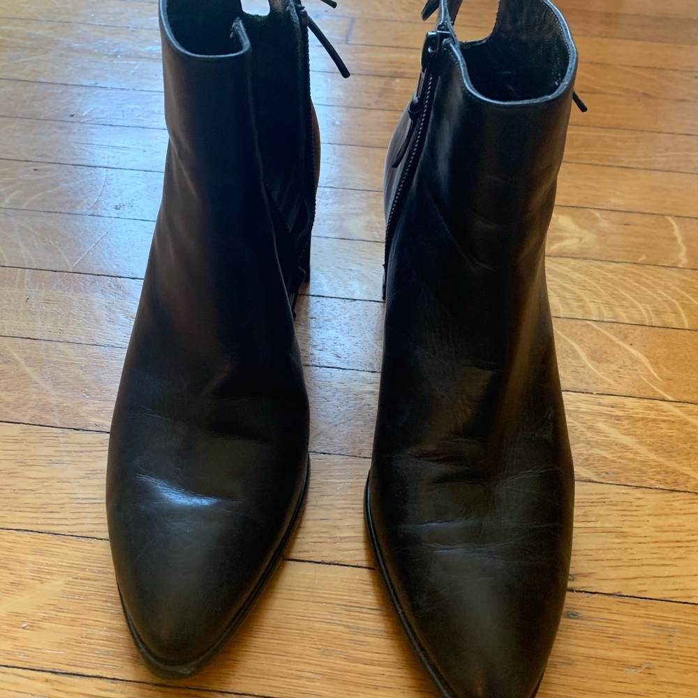 Stuart Weitzman Black Ankle Booties with Sleek Design and Side Zippers